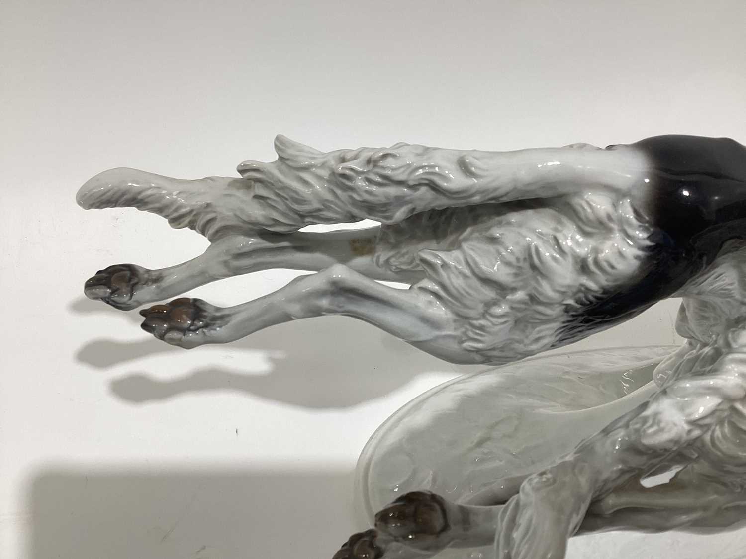 A Rosenthal porcelain figure of two Borzoi Wolfhounds racing, on an oval base, 61cm longWould benefi - Image 13 of 17