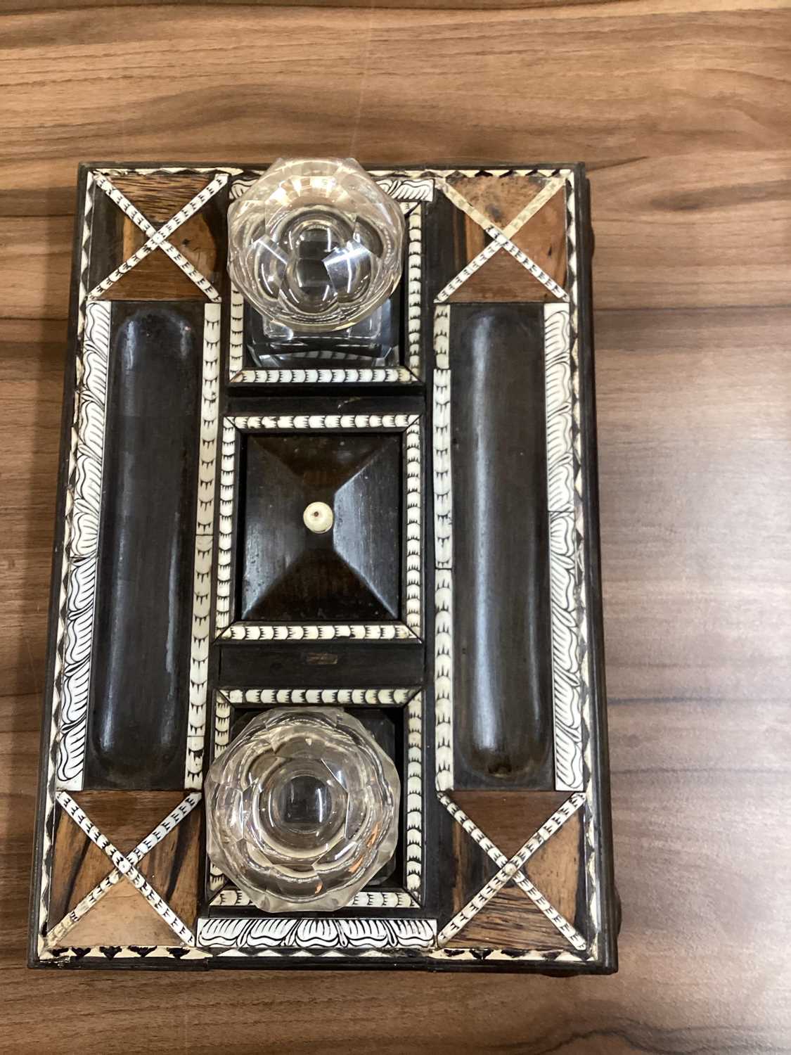 A Ceylonese ebony desk stand with calamander, coconut palm, and rosewood parquetry within pen-worked - Image 17 of 17