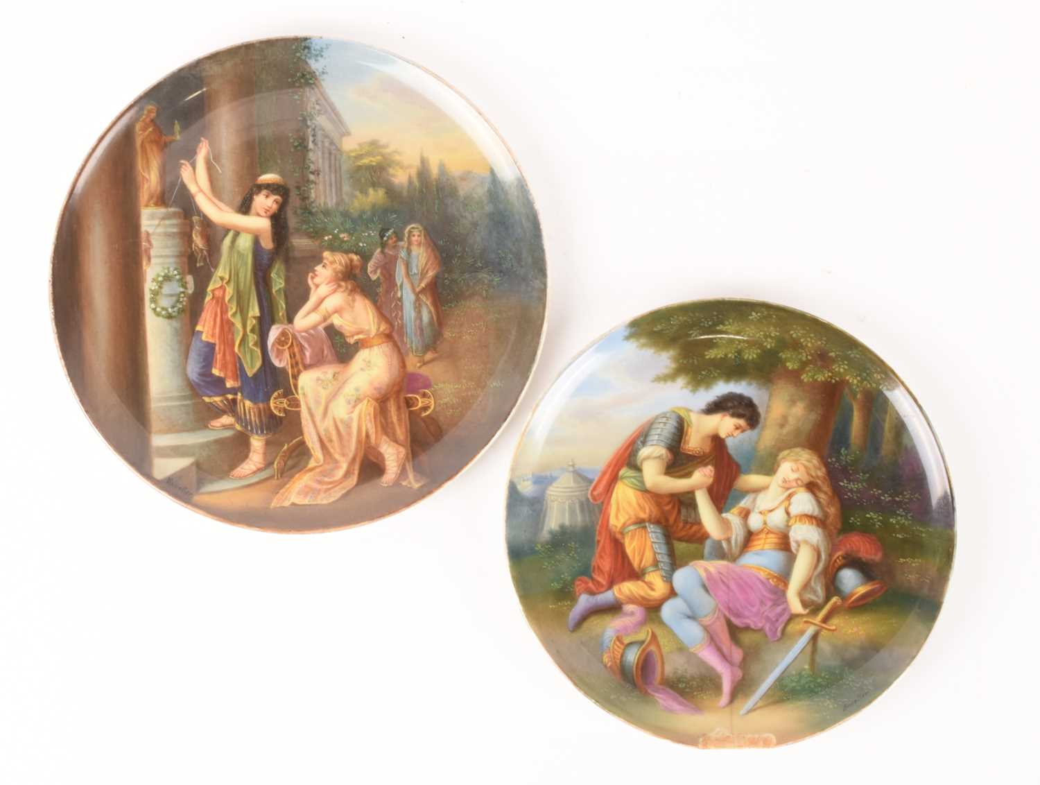 A pair of Royal Vienna-style porcelain cabinet plates, one depicting Tancredi and Clorinda and the o