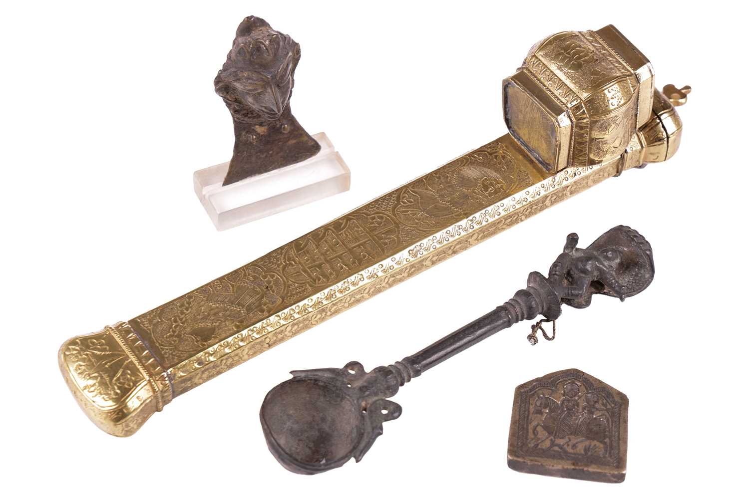 An Islamic gilt brass Qalamdan Divit scribes case, with Arabic calligraphy and decorative vignettes,