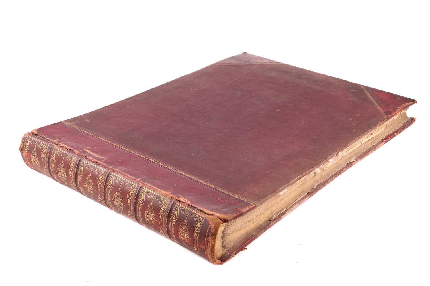 A large 19th-century leather-bound scrap album, gilt-tooled spine, containing numerous colour prints