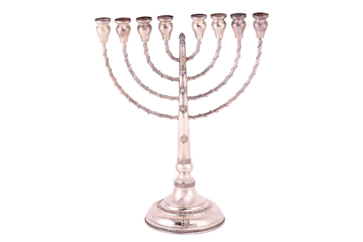 A Hanukkah menorah, an eight-branched candelabrum with twisted cable work decoration, supported on a - Image 3 of 4