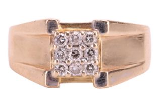 An angular diamond-set cluster ring, the nine round brilliant diamonds claw-set in a square design, 