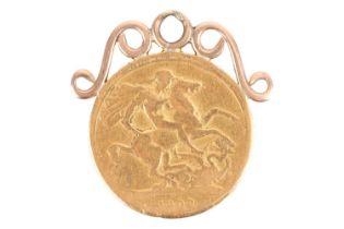 A mounted double sovereign pendant, consisting of a heavily worn Edward VII double sovereign, dated 