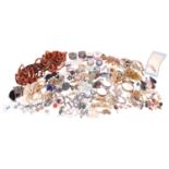 A large quantity of costume jewellery consisting of plated and silver necklaces, bracelets and earri