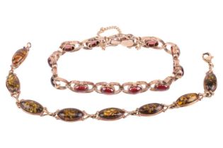 Two gem-set bracelets, comprising a bracelet set with cabochon garnets, measuring 18cm in length, wi