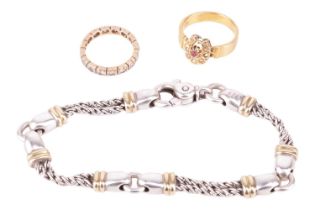 A group lot of jewellery consisting of ruby and split pearl ring, a paste set eternity ring, and a s
