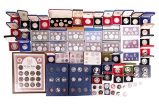 A large collection of commemorative coins and coin sets, to include ten cased New Zealand proof silv
