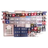 A large collection of commemorative coins and coin sets, to include ten cased New Zealand proof silv