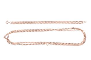 A 9ct gold scroll link chain necklace and matching bracelet; the necklace measuring approximately 78