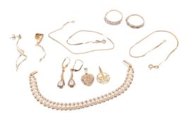 A small collection of jewellery, including a diamond half hoop ring with partial hallmarks and testi