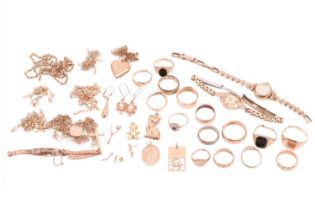A large collection of jewellery items including sixteen 9ct yellow gold rings, two ladies wristwatch