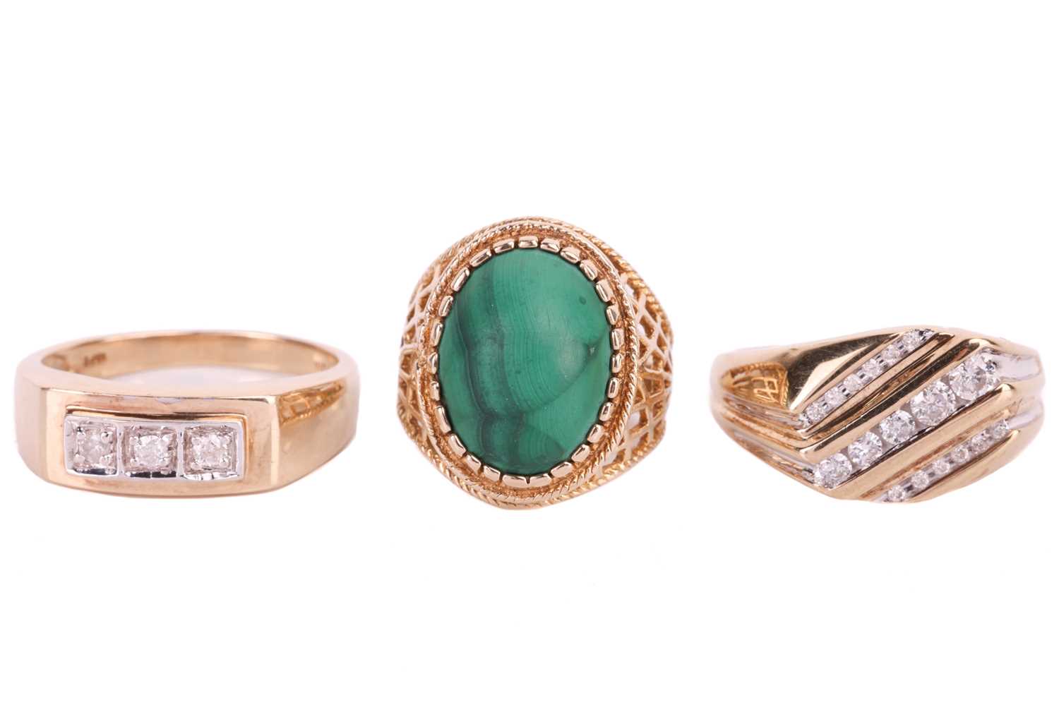 A collection of three 9ct yellow gold rings comprising a malachite-set dress ring, the malachite cab