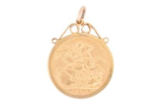 A 1908 Edward VII full gold sovereign, mounted in a 9ct gold case; 9.8 grams