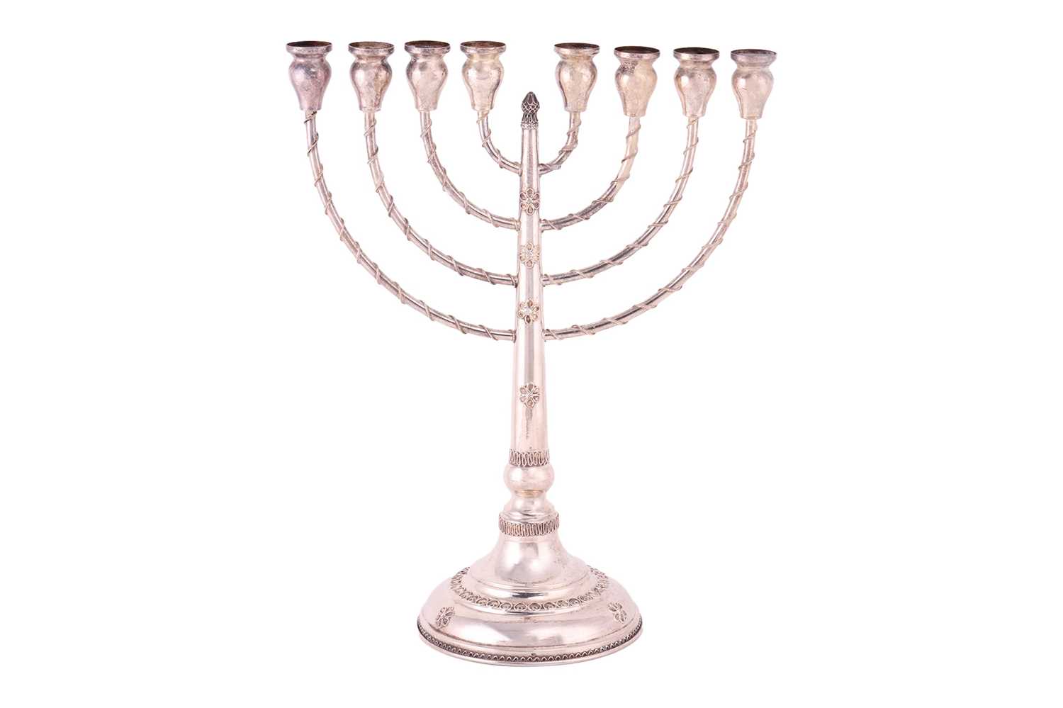 A Hanukkah menorah, an eight-branched candelabrum with twisted cable work decoration, supported on a - Image 2 of 4