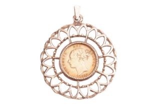An 1884 Victoria young head half sovereign, mounted in a round pierced pendant of floral design; 10.
