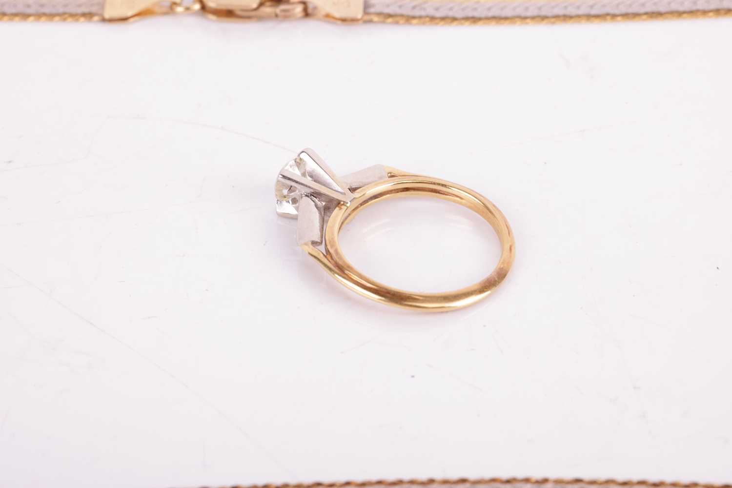 Two 9ct gold necklaces and a diamond solitaire ring; the first necklace consists of a flat herringbo - Image 3 of 3