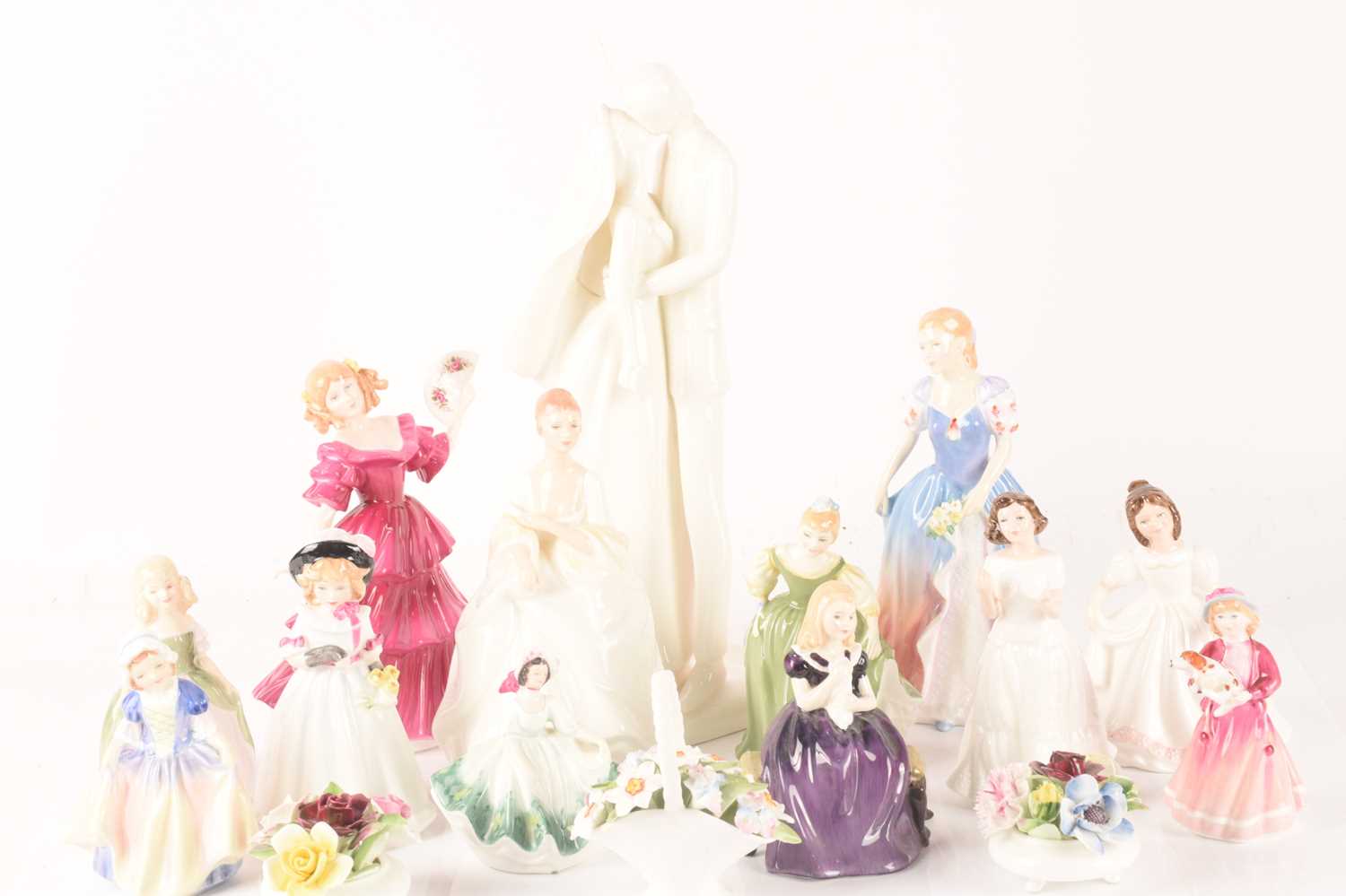 A collection of Royal Doulton 'Pretty Ladies' comprising, Wedding Day, Megan, Pamela, Jennifer, Fair