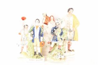 A collection of Staffordshire and Staffordshire style figures comprising a flatback Highlander and