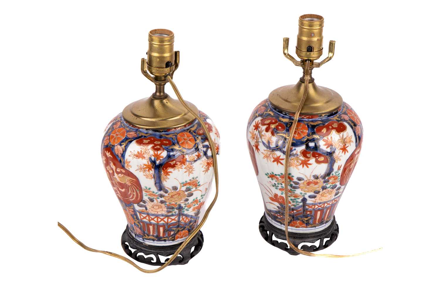 A close pair of Japanese Imari porcelain table lamps, late Meiji period, with carved hardwood stands - Image 3 of 14