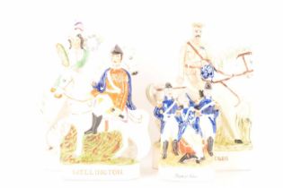 A collection of Staffordshire and Staffordshire style flatback figures comprising Wellington, Peace,