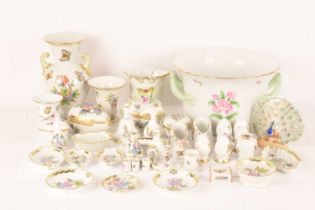 A large group of Herend porcelain in the Queen Victoria pattern comprising a baroque-style handled