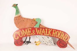 A group of 20th-century Folk art hand-painted carnival decorations comprising a large pheasant, a ma