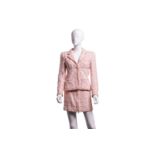 Chanel - a two-piece suit in peachy-pink tweed, from 1995 Spring and Summer ready-to-wear collection