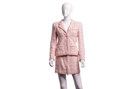 Chanel - a two-piece suit in peachy-pink tweed, from 1995 Spring and Summer ready-to-wear collection