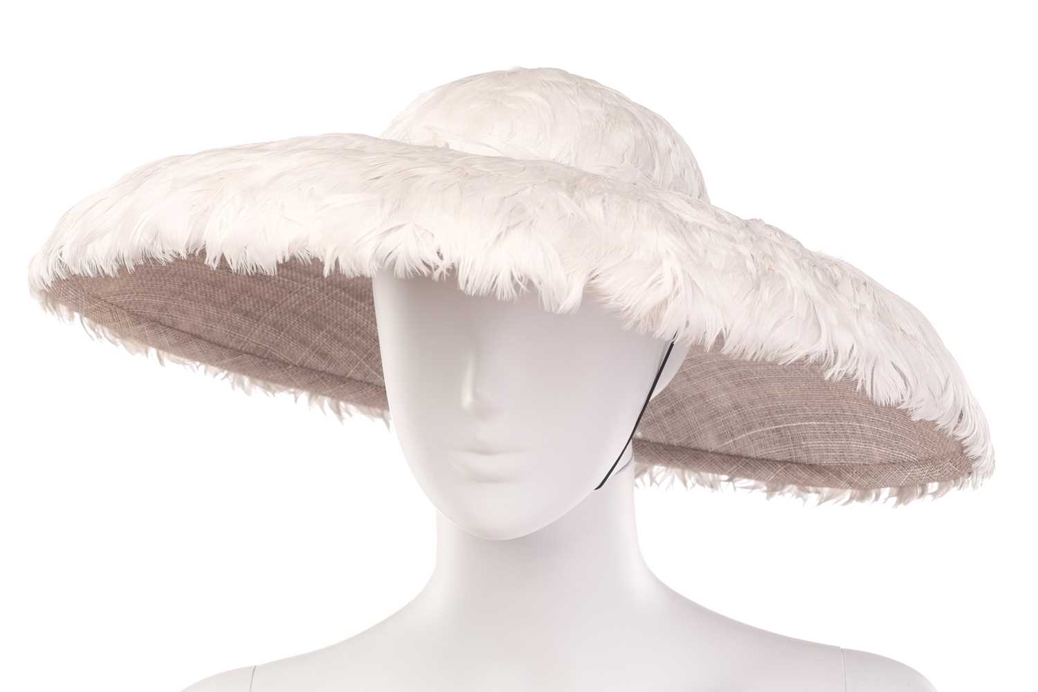 A collection of three hats; including a Philip Treacy fascinator with grey falling feathers around t - Image 15 of 17