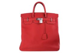 Hermès - a 'Haut à Courroies' HAC Birkin 40 in Capucine Togo leather, 2015, leather-lined body with 