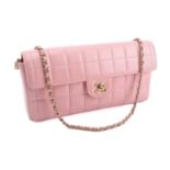 Chanel - an East West Chocolate Bar bag in baby pink lambskin leather, elongated rectangular body wi