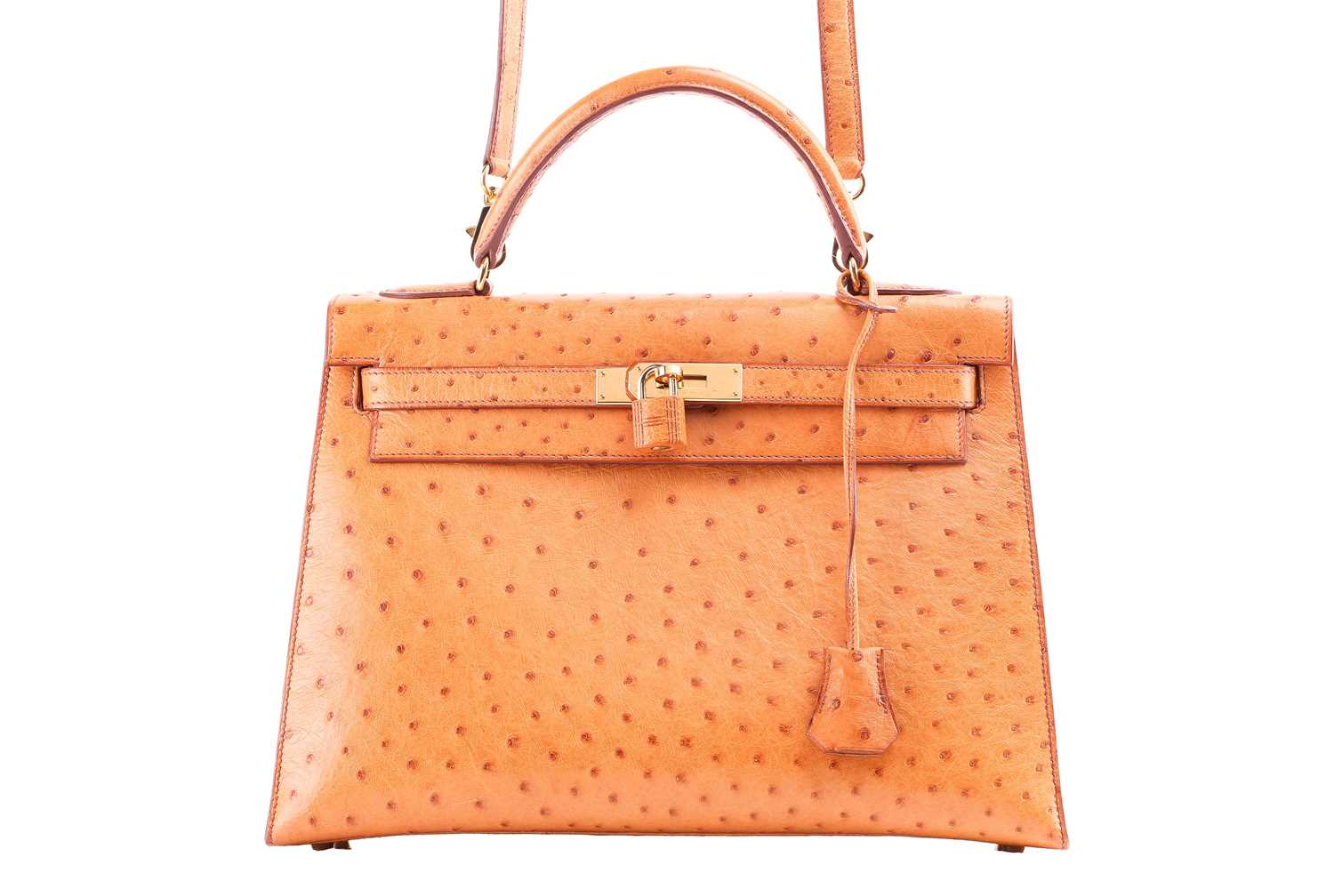 Hermès - a Kelly Sellier 32 in gold ostrich leather, 1999, tapered structured body with gold-tone ha - Image 4 of 18