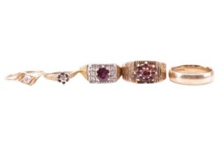 A collection of five rings; to include a gem-set ring centred with an oval-cut ruby on a diamond-set