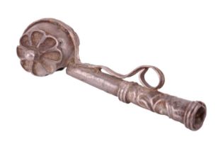 A 17th century Continental white metal bosun's whistle or caller, unmarked, 4.5 cm in length,