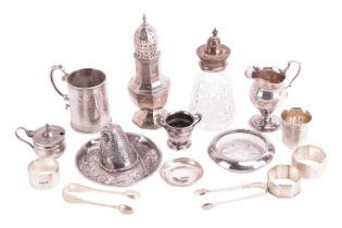 A small collection of miscellaneous items; to include examples of a Victorian silver christening mug