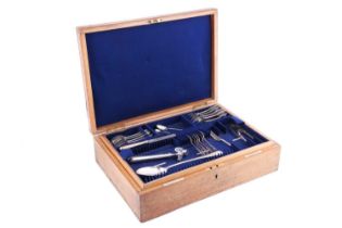 A group of mixed silver flatware and a plated bone holder in an oak canteen case; to include: 6x