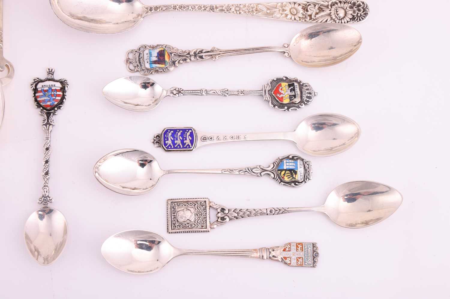 A small group of assorted souvenir spoons with enamel finials; and a set of six cordial glasses in w - Image 3 of 9