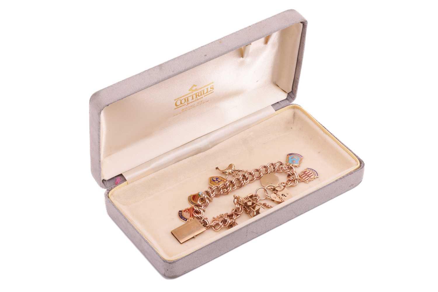 A 9ct gold charm bracelet featuring ten charms including a highchair, a set of three keys, a hinged  - Image 3 of 3