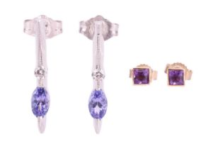 Two pairs of gem-set earrings; to include a pair of oval-cut tanzanite and diamond accent drop