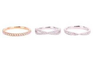 Three diamond-set wedding bands in 18ct gold; to include a diamond pavé-set half-eternity ring in