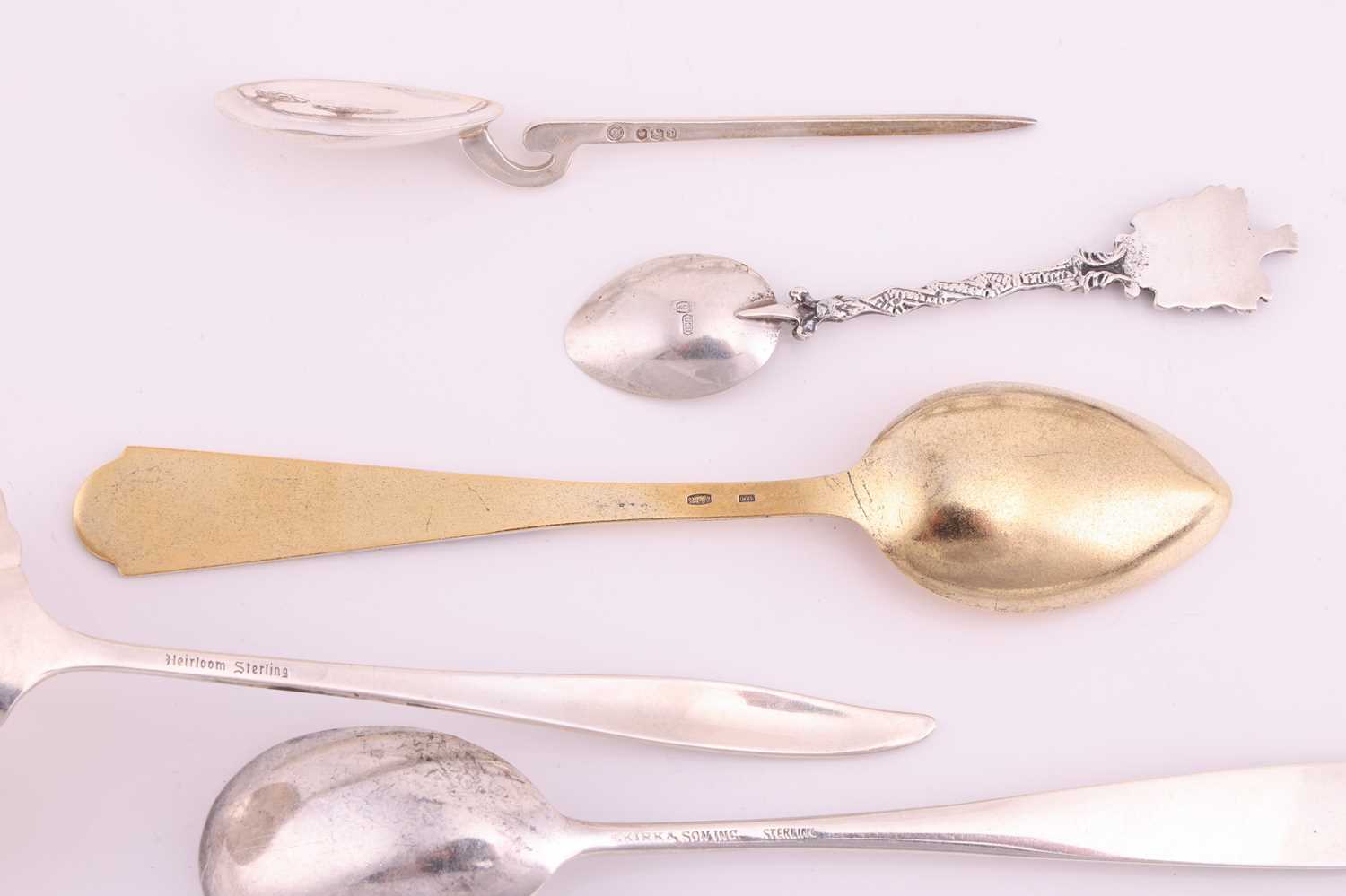 A small group of assorted souvenir spoons with enamel finials; and a set of six cordial glasses in w - Image 8 of 9