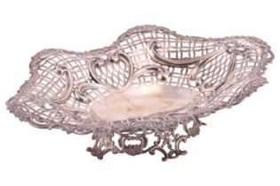 A late Victorian large silver lobed navette form fruit comport, London 1890 by William Comyns,