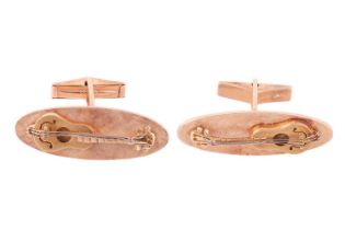 A pair of Baroque guitar cufflinks, elongated oval panels with a cross-hatched finish ground,
