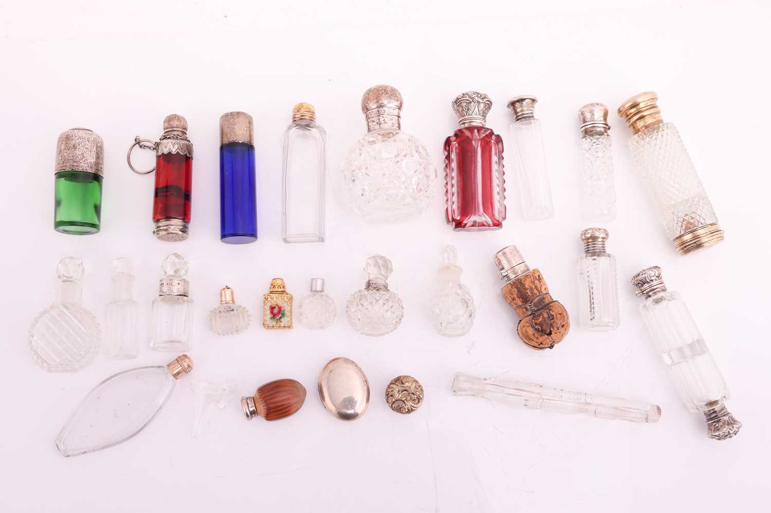 A collection of cut glass scent bottles, many with silver mounts, one featuring an enamel portrait c - Image 5 of 5