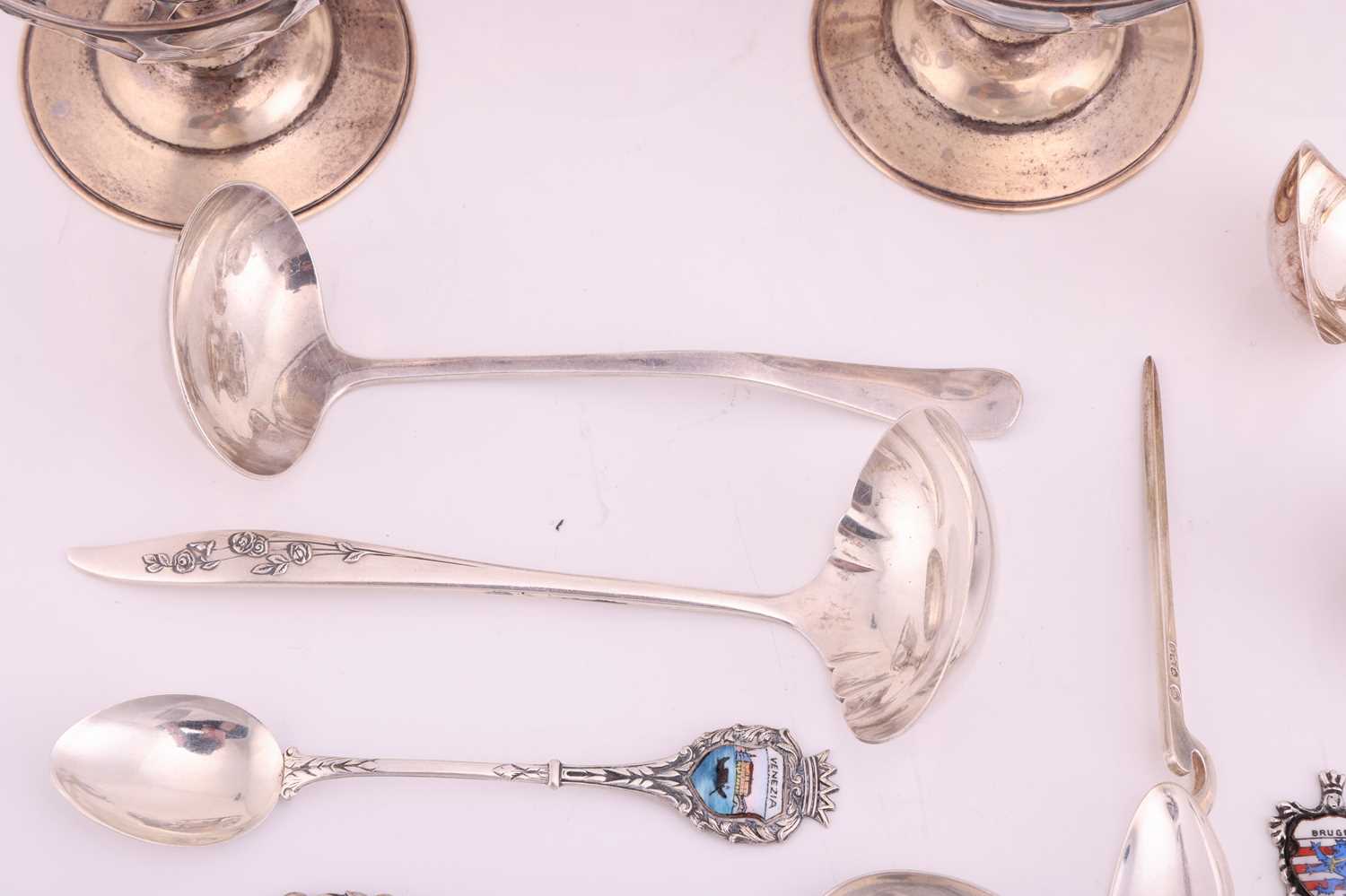 A small group of assorted souvenir spoons with enamel finials; and a set of six cordial glasses in w - Image 4 of 9
