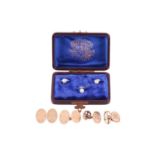 Two pairs of gold cufflinks and a box of dress studs; to include a pair of monogrammed oval panel cu