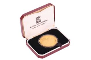 A first passenger Concorde flight medallion silver coin, gold plated, stated Jan 21st 1976,