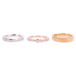 Three 18ct gold rings; to include a diamond-set dress ring in 18ct rose gold, size L; a channel-set 