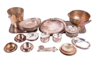 A collection of silver plate to include four salvers, a cake stand, two placemats, an ice bucket,